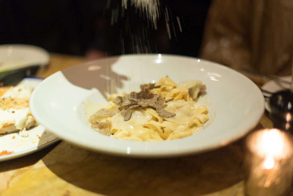 Truffle Pasta with fresh shaved parmesan at Bond 45 NYC